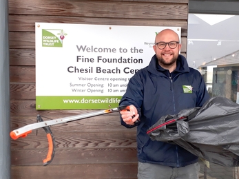 Marc Kativu-Smith going on a beach clean at Chesil by Dan Bartlett 