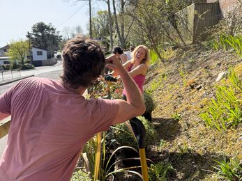 Volunteers planting up the bus bay area over the Easter holidays. 