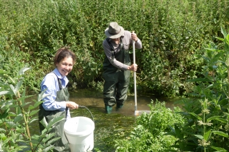 Riverfly volunteers in river © Angus Menzies 