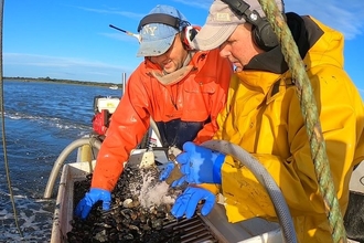 Photo showing fishermen on boat