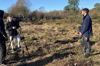 Photo showing Bournemouth uni students filming at Upton Heath