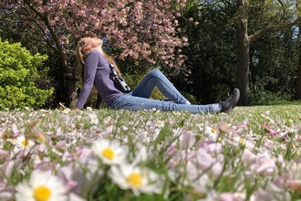 Woman sitting in a park