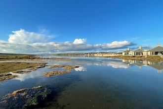 A view of the Wild Chesil Centre looking across the water