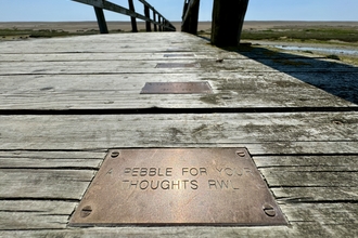 Chesil boardwalk with plaque 