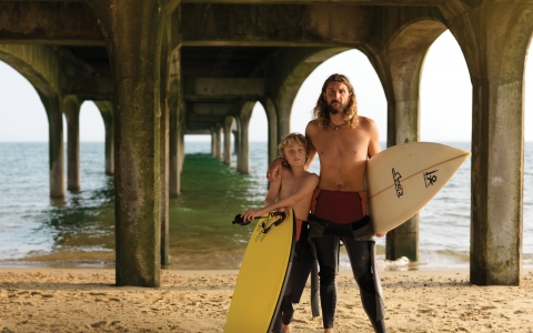 Father and son with surf boards