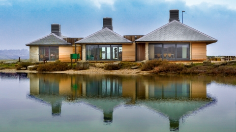 Visit-Dorset - A fantastic shot over Chesil Beach and the Fleet Nature  Reserve. 💦⁠ Chesil beach is a bank of pebbles stretching for 18 miles  along the Dorset Coast. Trapped behind this