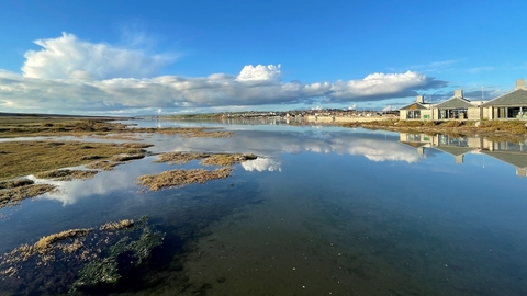 A photo of the Wild Chesil Centre taken looking across the water