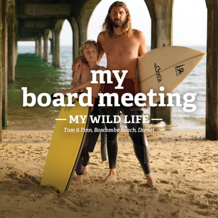 Father and son with surf boards
