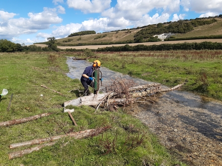 Installing large woody on the Devils Brook to help reconnect the channel with the floodplain 