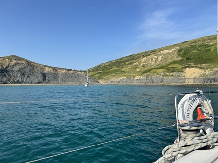 View across sea from back of boat