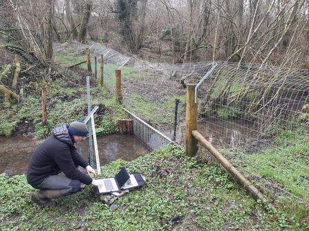 A person undertaking hydrology research at Dorset Beaver Project