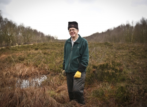 Philip stands in a bog